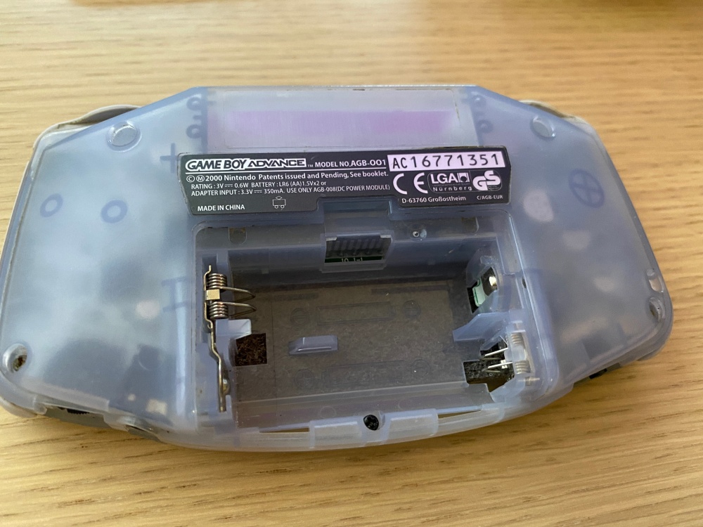 Game Boy Advance - missing its battery cover