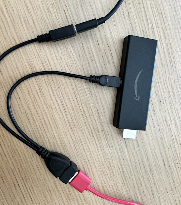 USB OTG cable connected to the Fire TV Stick and a keyboard