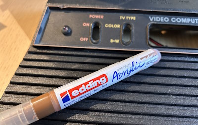 Brown acrylic pen for touching up the Atari 2600 case