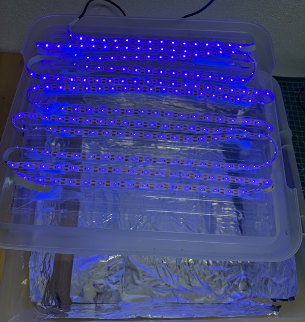 A plastic box with UV led strips